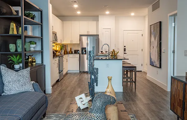 Furnished apartment living area shown at The Governor.